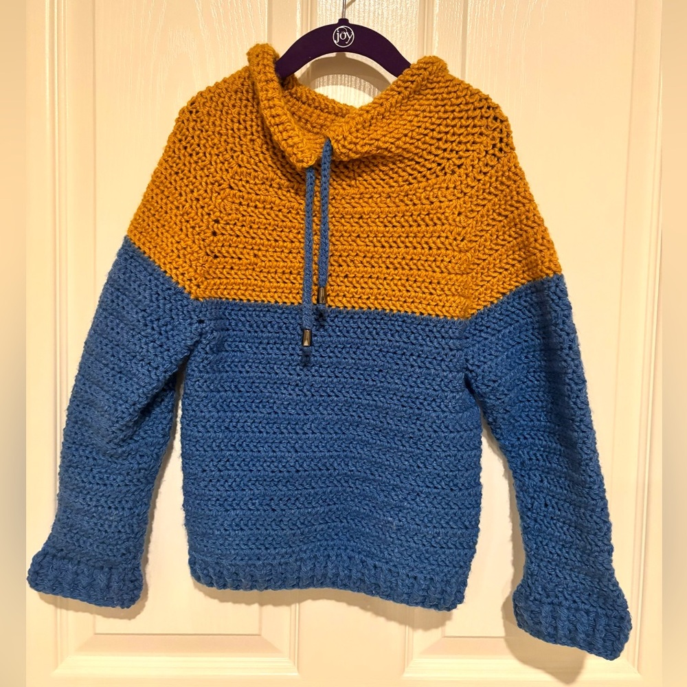 Little boy knitted sweater, blue and copper